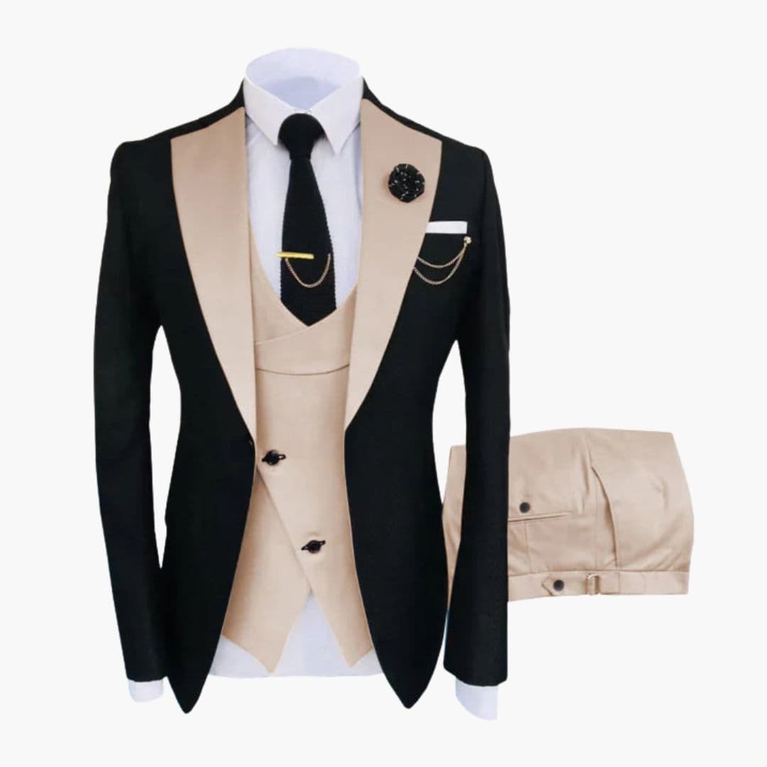 Men's black three-piece ceremonial suit with contrasting collar, buttoned vest, and gold chain accents