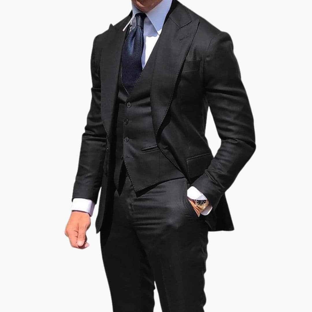 Men's charcoal three-piece suit with buttoned vest, notched lapel blazer and straight-fit trousers
