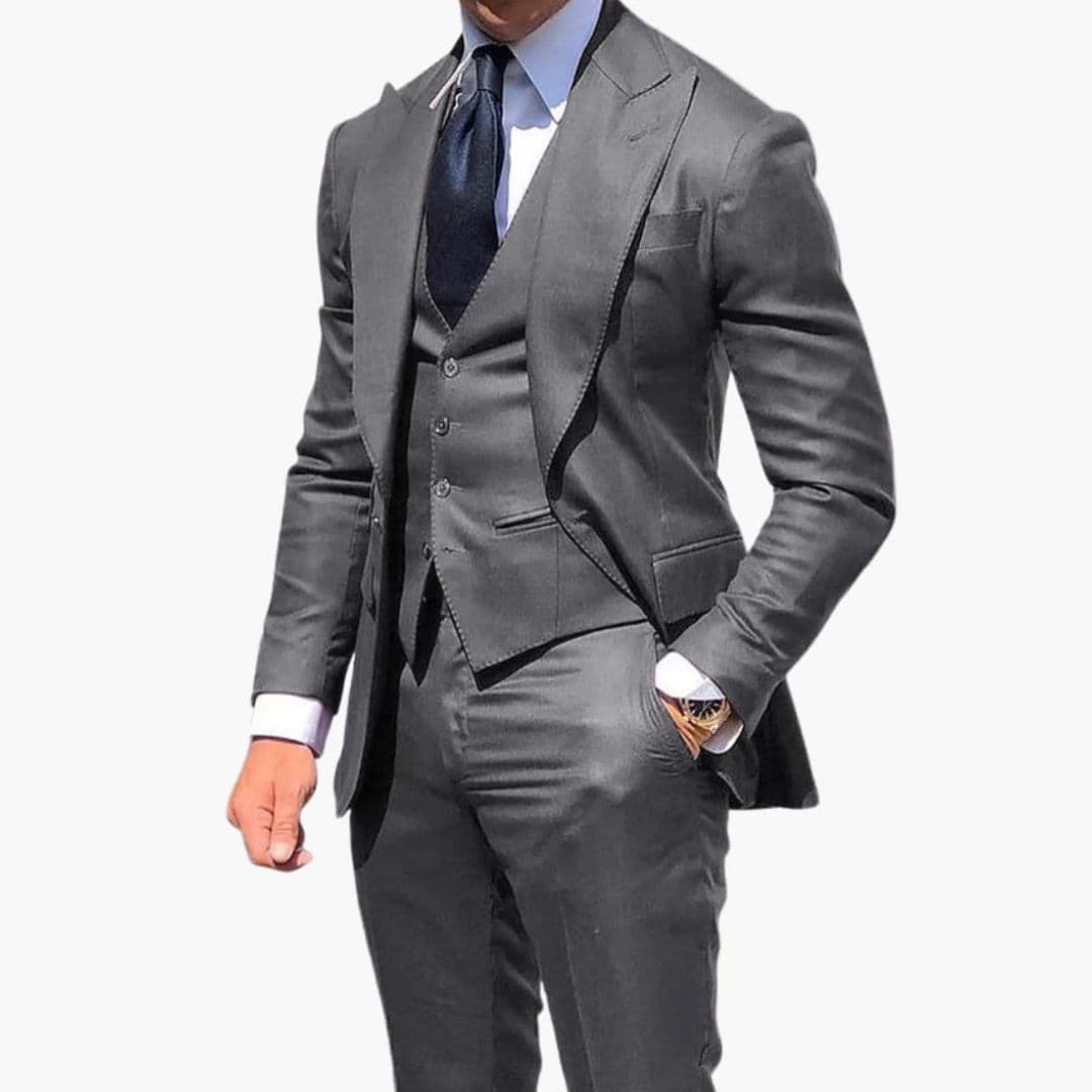 Men's charcoal three-piece suit with buttoned vest, notched collar blazer, and straight-fit trousers