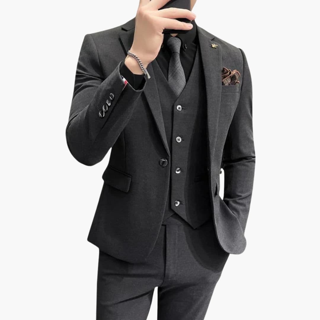 Men's slim fit three-piece suit with vest, modern tailored cut for formal year-round wear