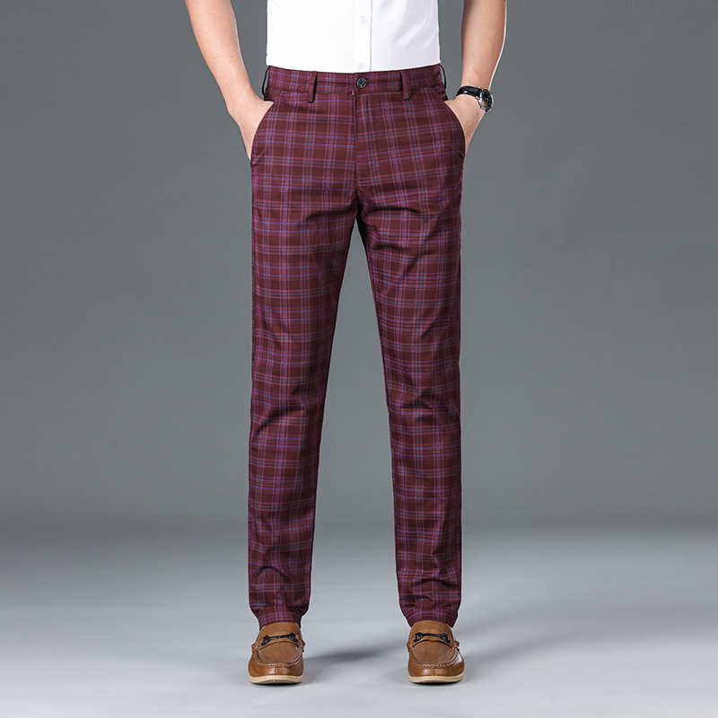 Tapered plaid check trousers with zip fly and belt loops for a polished professional look