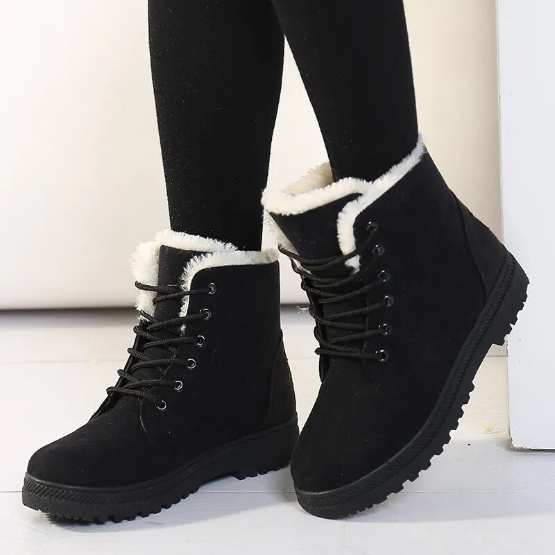 Women's cozy slip-on ankle boots black fleece-lined water-resistant winter footwear all-day comfort