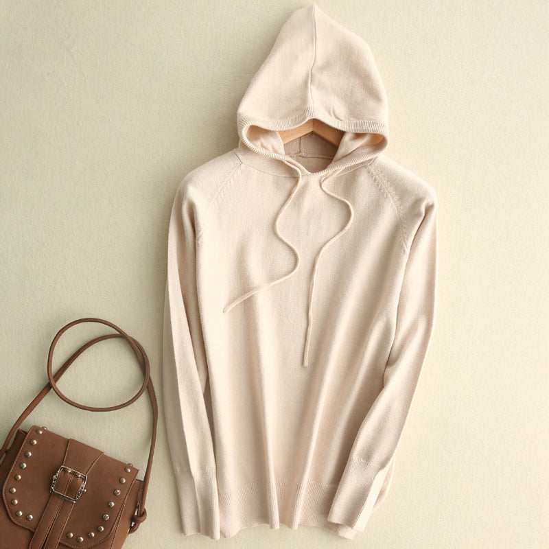 Lightweight soft knit hoodie in neutral tone, minimalist fine-knit texture with fluid drape for everyday style