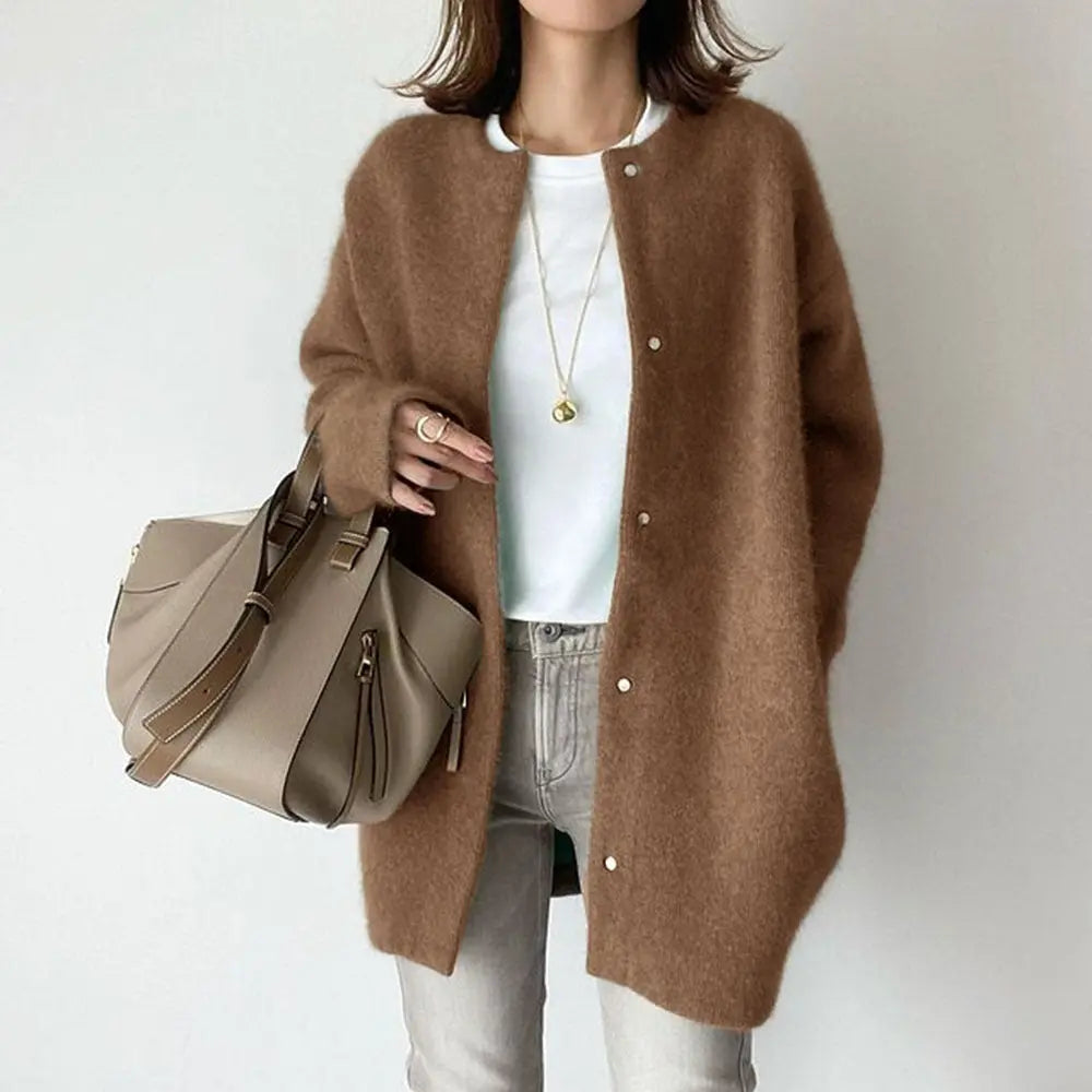 Women's relaxed-fit wool cardigan with suede accents, cozy chic style, and functional side pockets