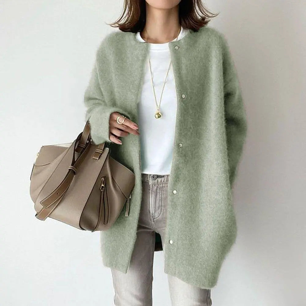 Women's relaxed-fit wool cardigan with suede accents, cozy pockets, modern chic style