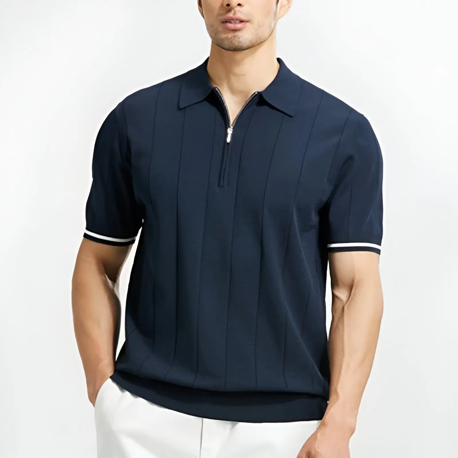 Men's navy blue quarter-zip polo knit short sleeve with bold contrast trim and vertical ribbing
