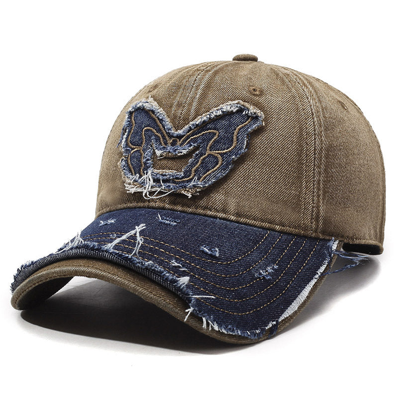 Women's washed denim baseball cap with embroidered butterfly, retro wings detail, curved brim