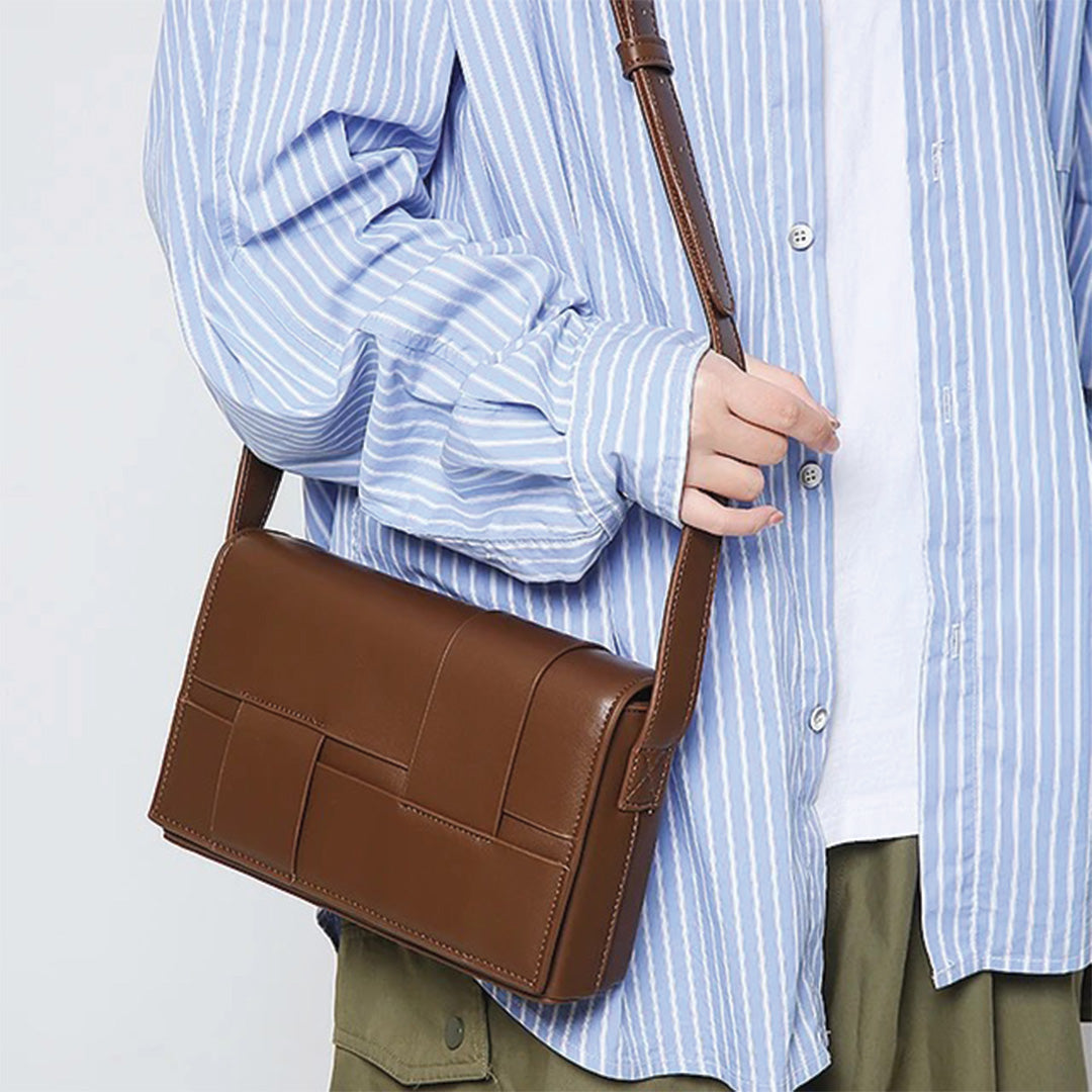 Urbann-Vibe Cruxly tan sustainable leather crossbody shoulder bag with crosshatch woven texture and adjustable strap