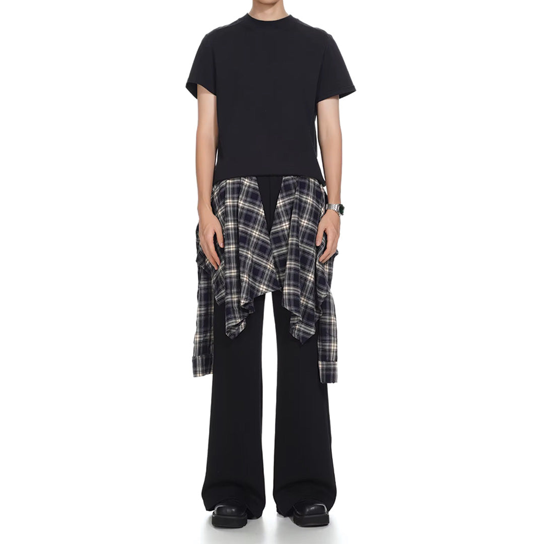 Loose-fit cotton sweatpants with bold plaid overlay attachment for high-fashion street style