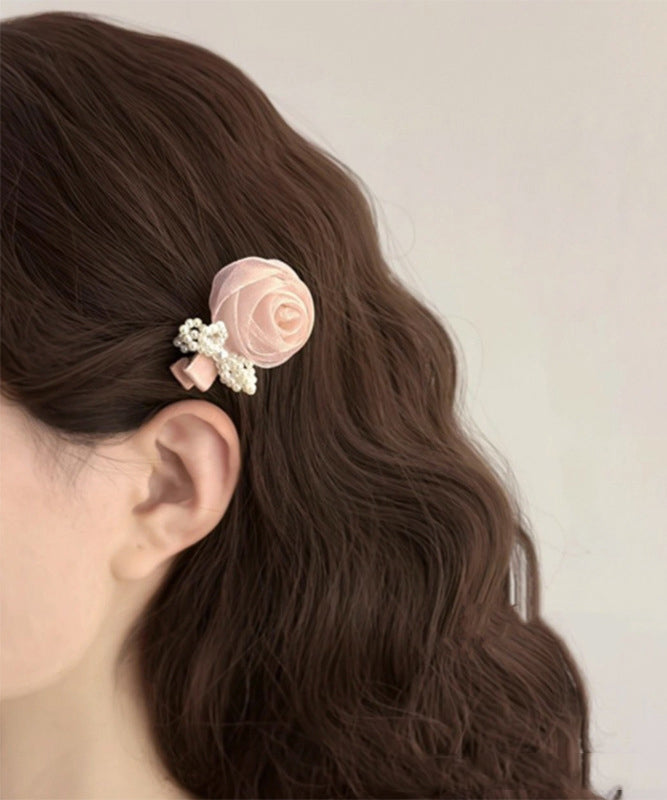 Jolie épingle à cheveux en mousseline de soie rose avec nœud en forme de rose - Urbann-Vibe