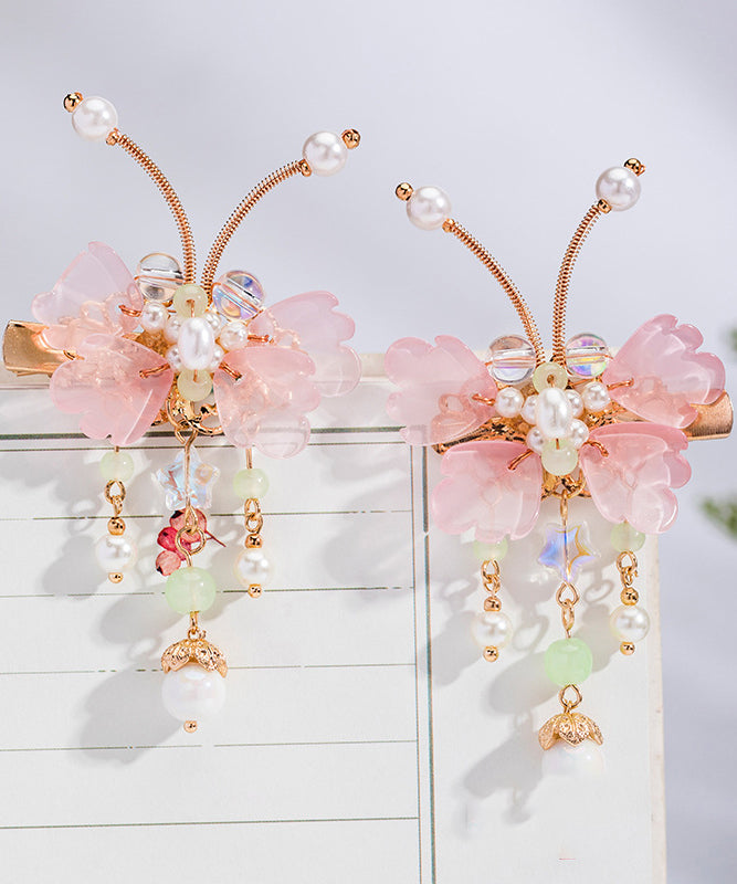 Jolie paire d'épingles à cheveux en alliage de cuivre rose avec perles et pompons papillon pour enfants - Urbann-Vibe