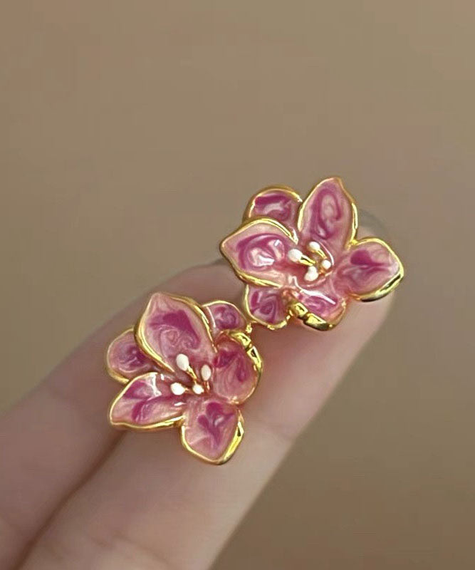 Boucles d'oreilles à tige en métal rose avec motif floral et vernis goutte à goutte - Urbann-Vibe