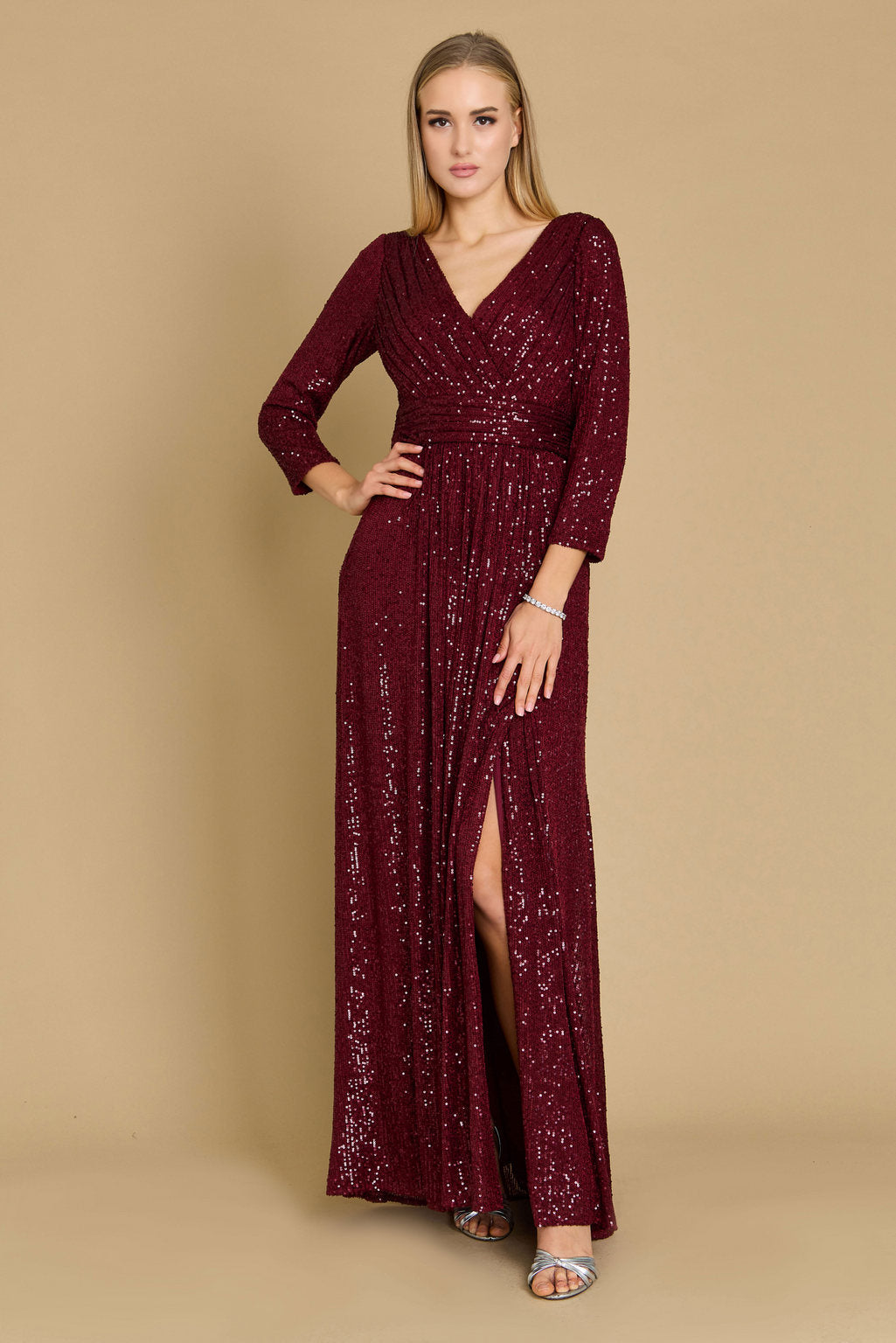 Long sleeve sequin prom dress with hand beaded detailing, sparkly formal gown for elegant evenings