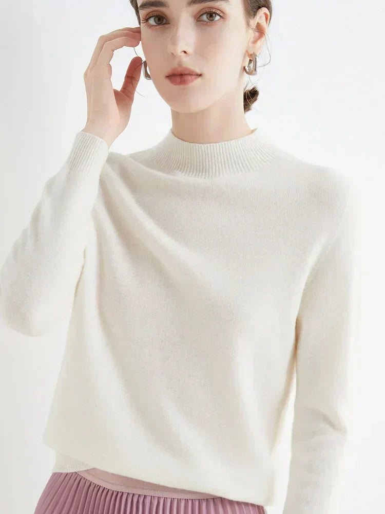 Elegant women's knit sweater in neutral tones, timeless silhouette for office and cozy evenings
