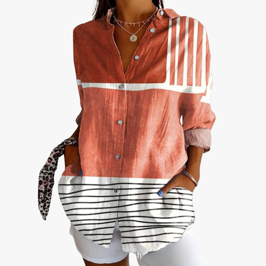 Women's white linen blouse with handcrafted embroidery, relaxed elegant fit for timeless artisan style