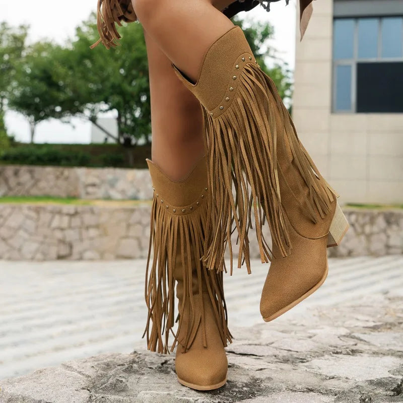 Women's black fringe high heel boots with silver stud accents, bold Western festival style
