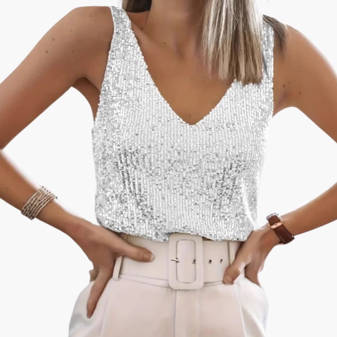 Women's silver sequined V-neck top with all-over reflective sparkle, perfect for festive eveningwear