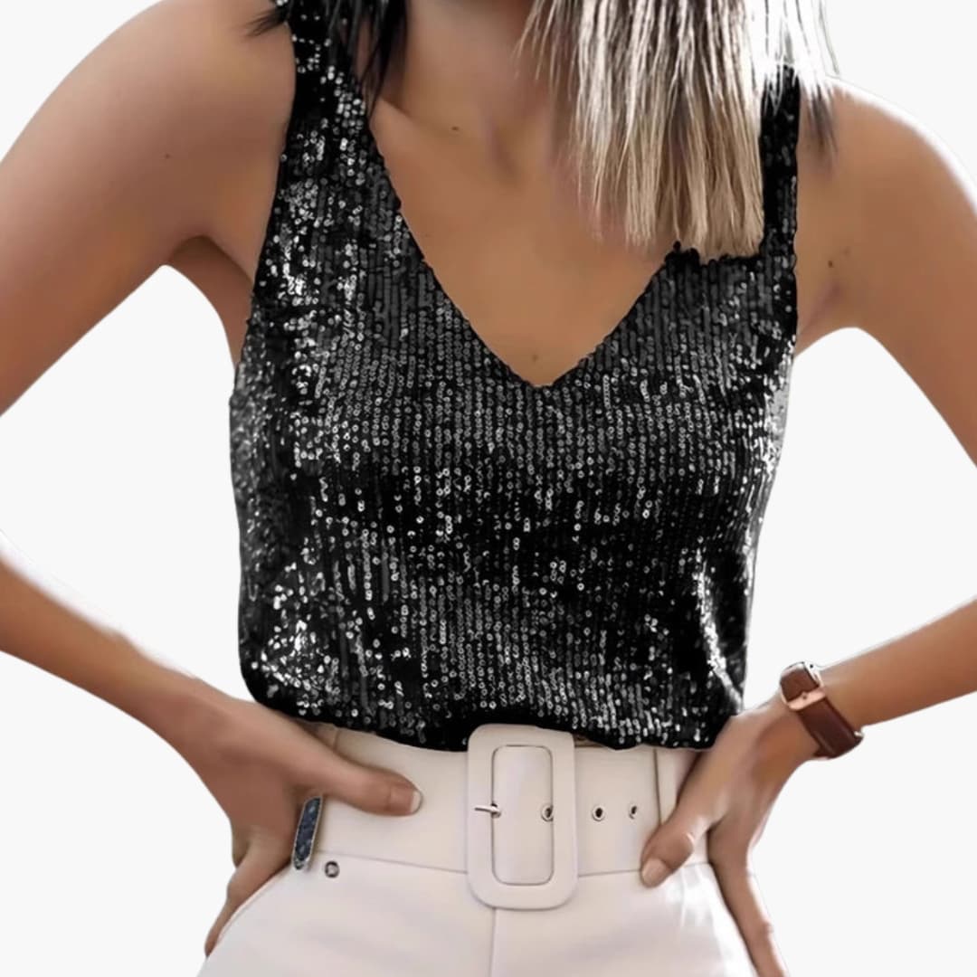 Women's silver sequined V-neck top with all-over reflective sparkle, perfect for festive eveningwear