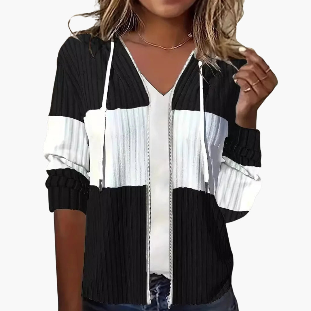 Women's zip-up hoodie with striped ribbed texture, drawstring hood, and full-length front zipper