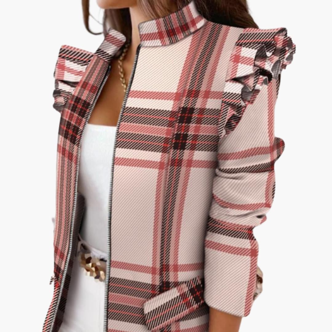Patterned women's jacket with stand-up collar, front zipper, and bold ruffled shoulders