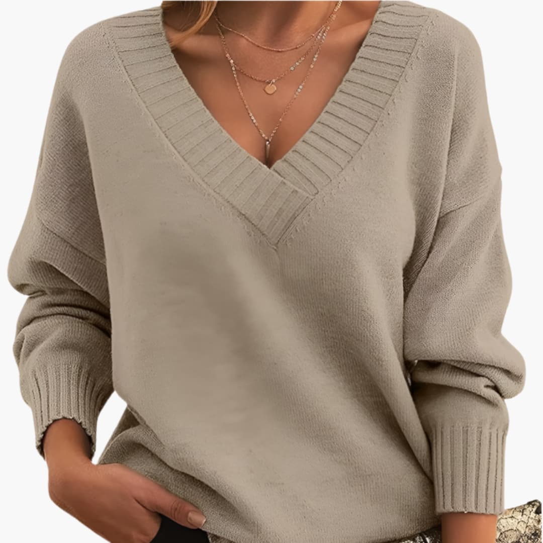 Women's oversized knit sweater deep V-neck ribbed cuffs cozy relaxed pullover casual style