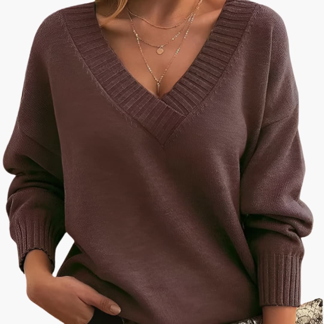 Women's oversized knit sweater deep V-neck ribbed cuffs cozy relaxed pullover everyday casual style