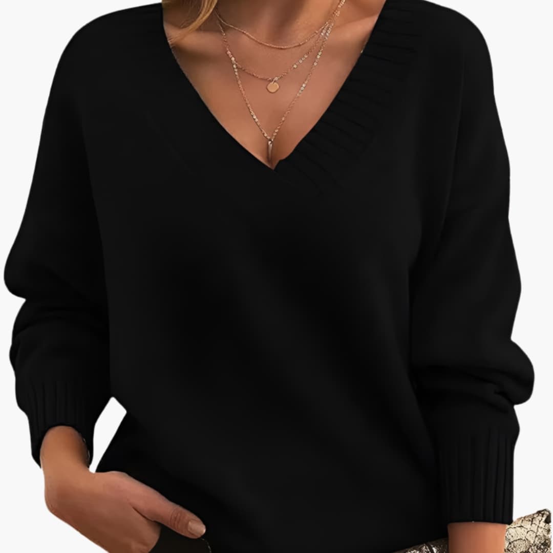 Women's oversized knit sweater deep V-neck ribbed cuffs relaxed pullover fit for cozy everyday style