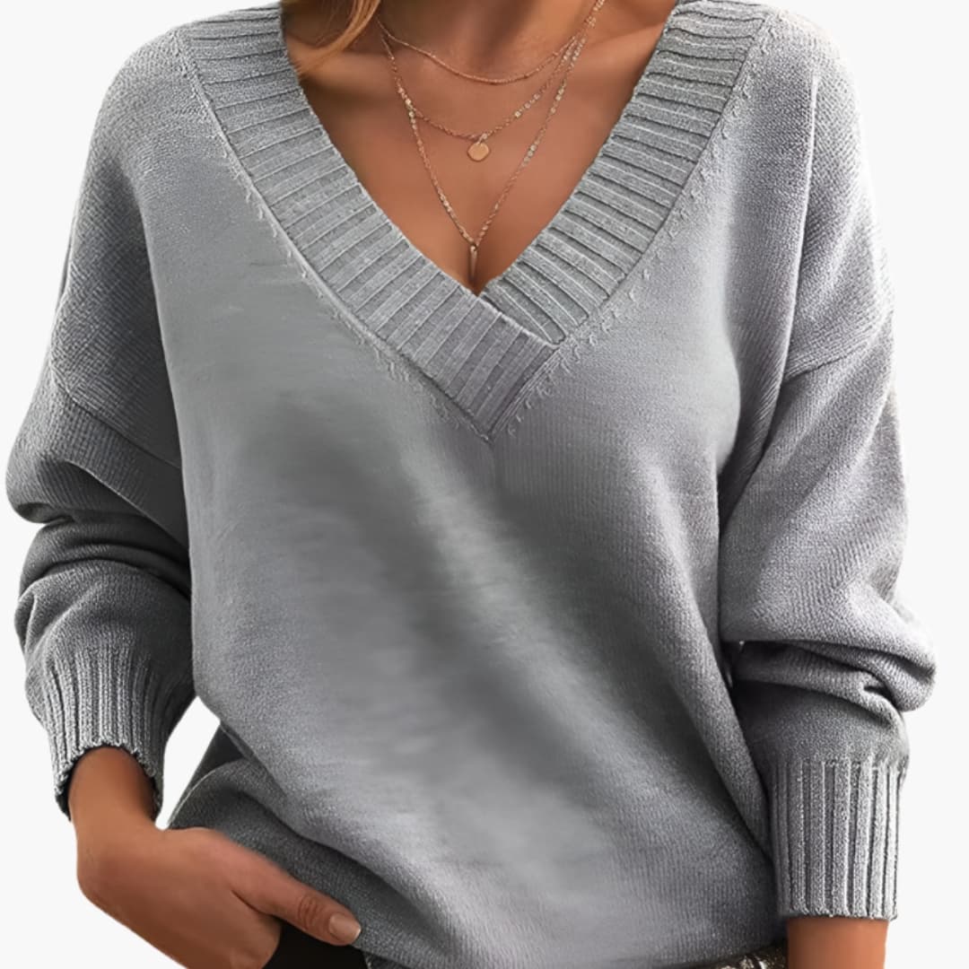 Women's oversized knit sweater deep V-neck ribbed cuffs cozy relaxed pullover everyday casual