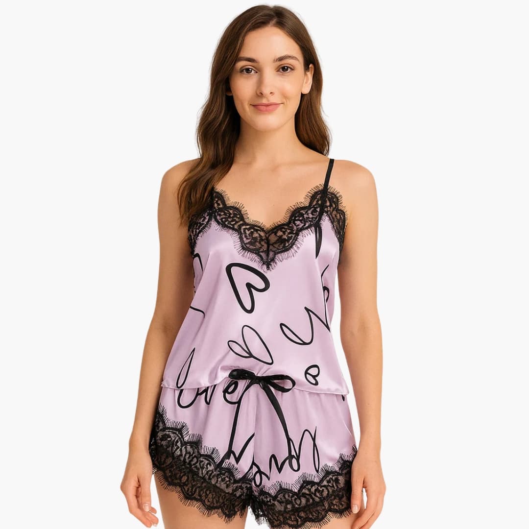 Women's spaghetti strap pajama set with printed shorts and lace trim neckline, soft sleeveless sleepwear