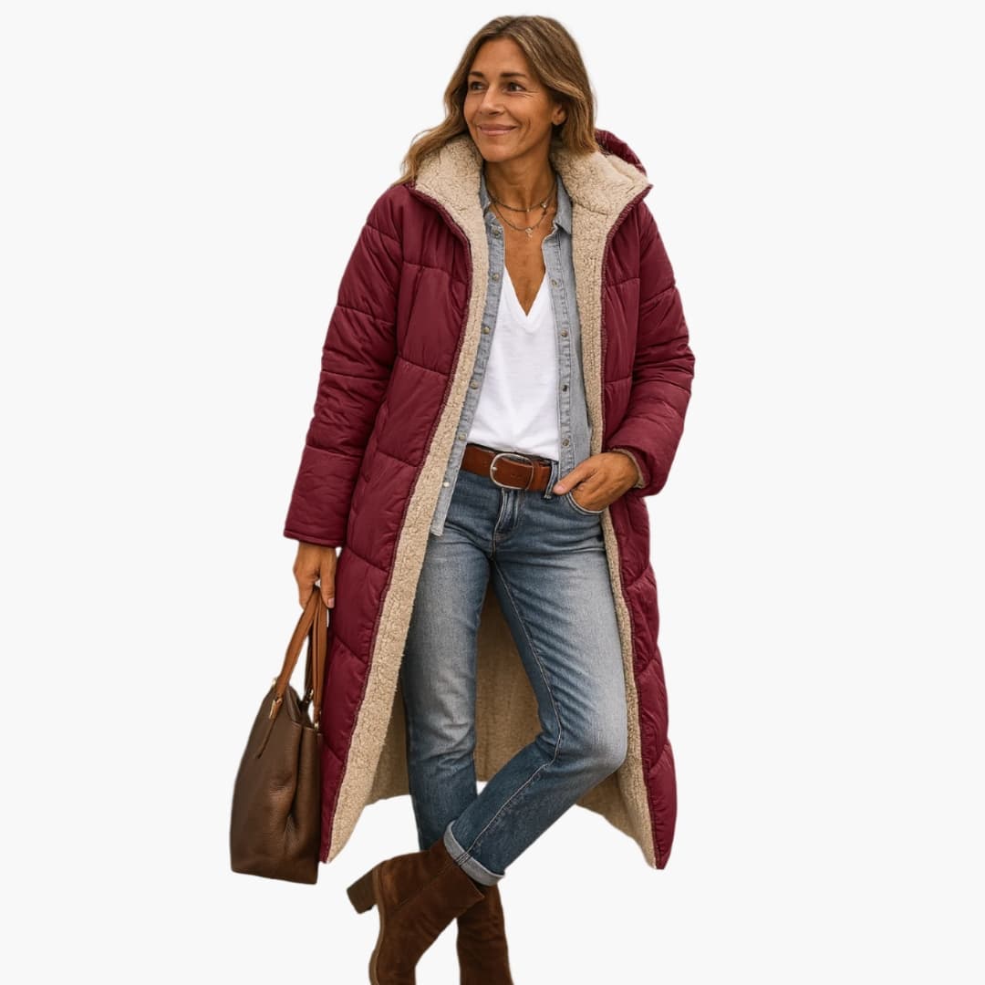 Women's black quilted puffer coat with fixed padded hood, full-zip closure, and lined interior