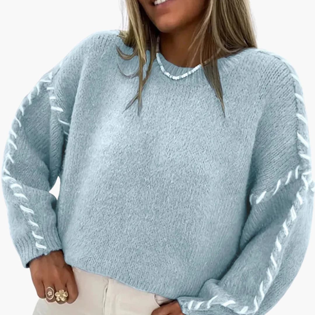 Women's round neck knit sweater with contrast seams, long sleeves, versatile everyday layering essential