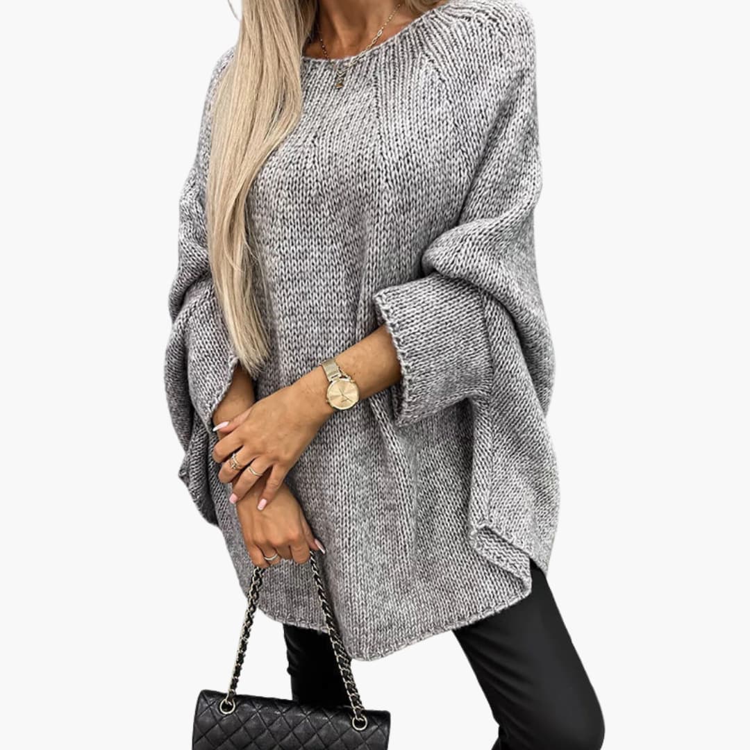Women's oversized knit sweater cozy loose fit round neck layering essential everyday wear