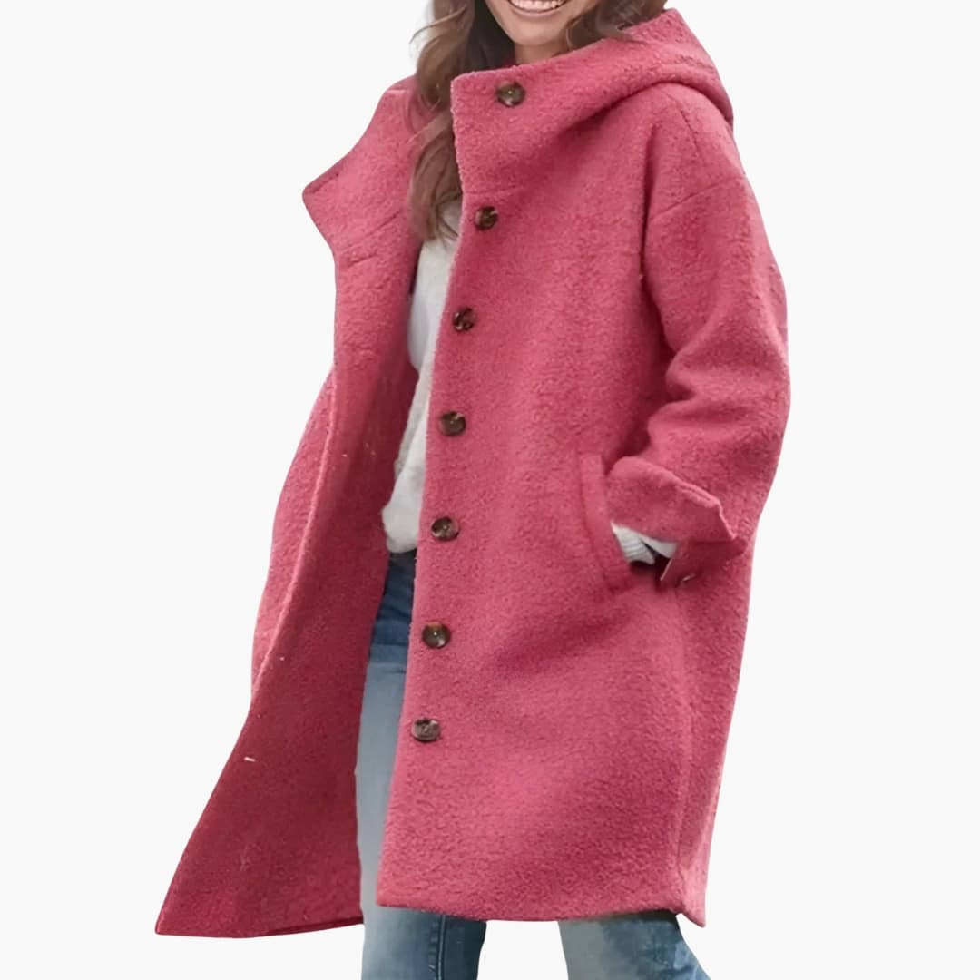 Women's knee-length winter coat with button closure, wide revers collar, and side pockets