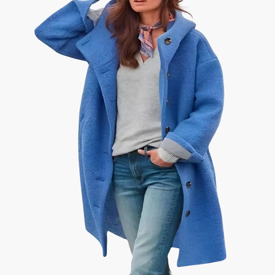 Women's knee-length winter coat with button closure, wide revers collar, and side pockets