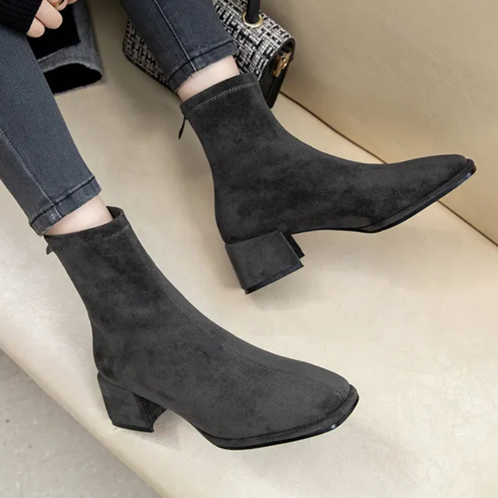 Women's ankle boots elegant refined silhouette timeless design versatile for office and evening wear