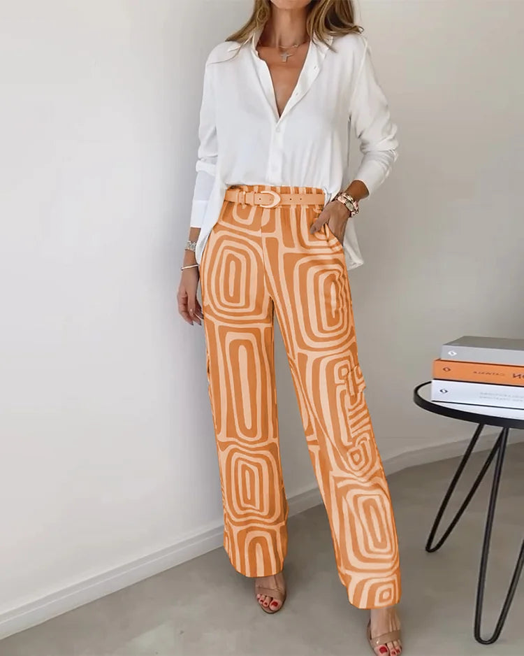 Women's minimalist blouse and pants two-piece set in neutral tones, polished work-to-weekend style
