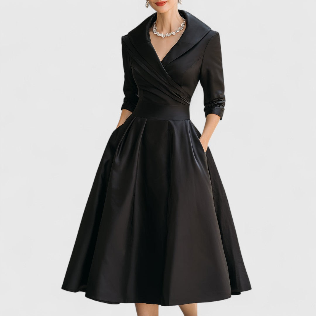 Women's midi wrap dress in elegant silhouette with flared skirt, defined waist, and hidden pockets