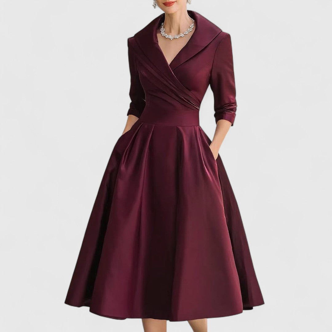 Elegant women's midi wrap dress with pockets, flared skirt, defined waist, formal evening style