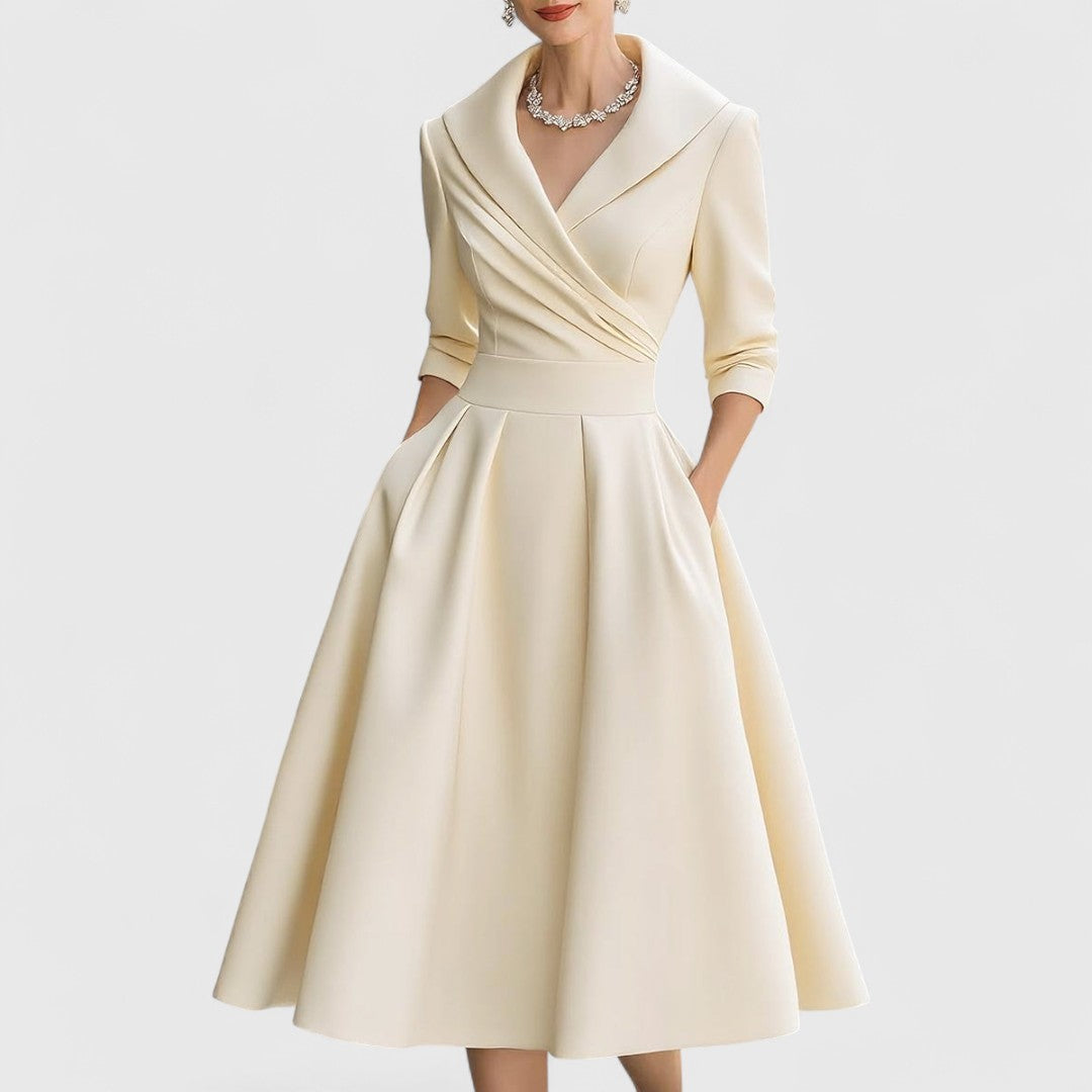 Women's midi wrap dress in elegant silhouette with flared skirt, defined waist, and hidden pockets