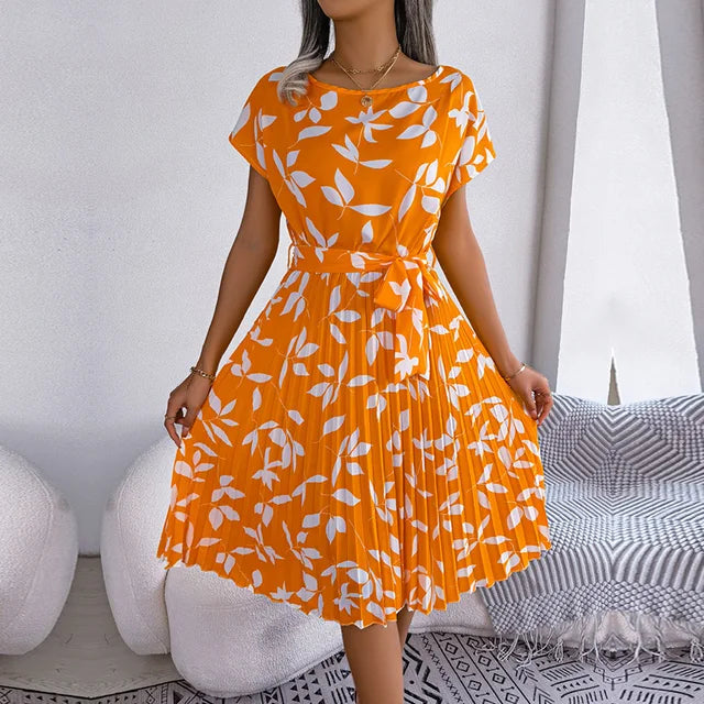 Women's floral print spring dress lightweight airy fabric relaxed fit flattering silhouette sunny day