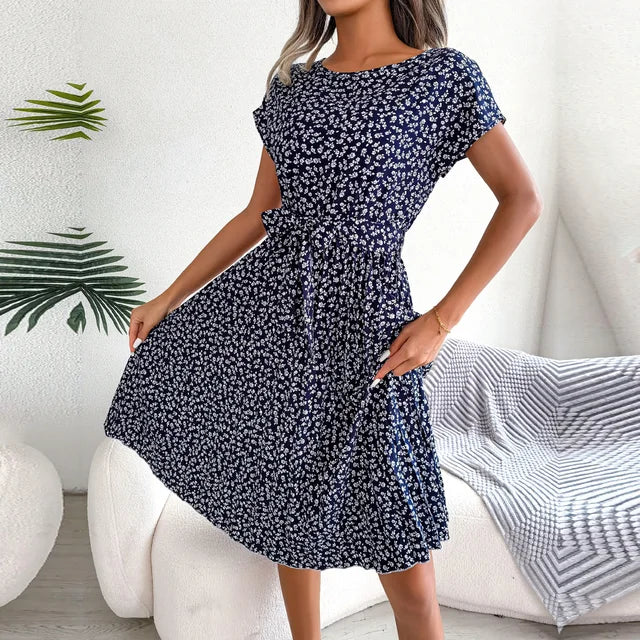 Women's floral spring dress lightweight airy fabric relaxed fit flattering silhouette sunny day style