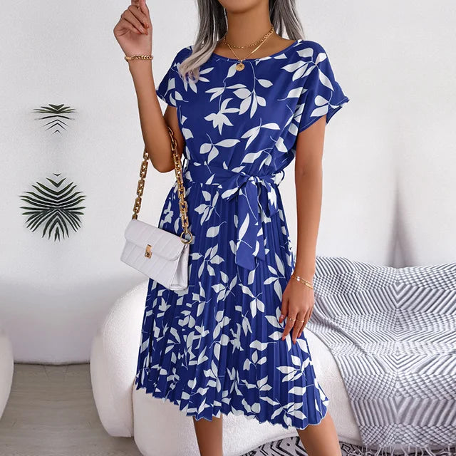 Women's floral spring dress lightweight airy fabric relaxed fit flattering silhouette for sunny days