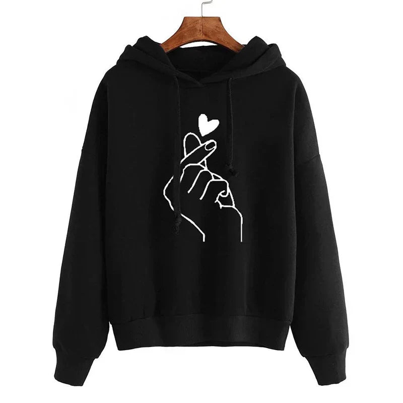 Women's cozy fleece hoodie with finger heart motif, soft plush fabric, kangaroo pockets, casual everyday style