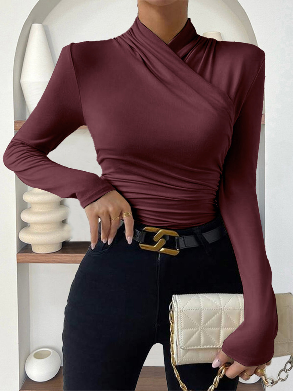Women's soft jersey wrap top with flattering silhouette and elegant crossover collar design