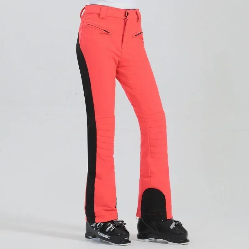 Women's slim fit ski pants waterproof fleece-lined polyester with high elasticity for winter slopes