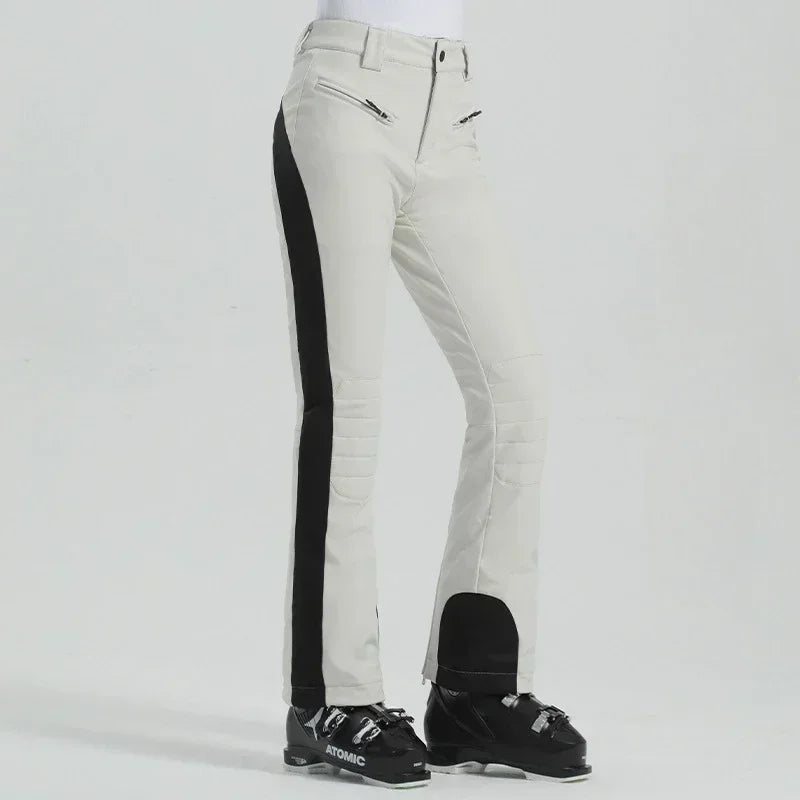 Women's slim fit ski pants waterproof fleece-lined polyester with high elasticity for winter slopes