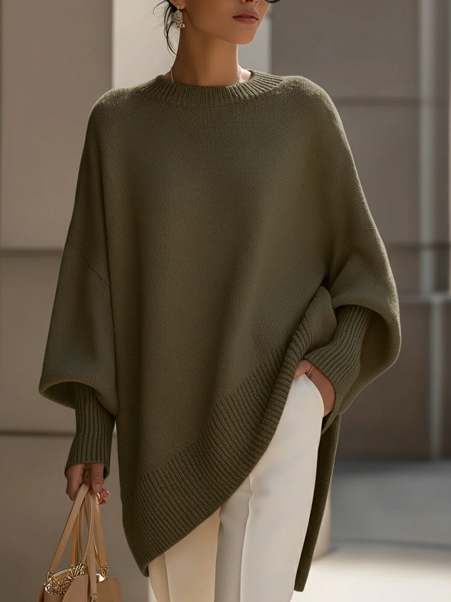 Women's oversized cream knit sweater with textured loose fit long sleeves for everyday layering