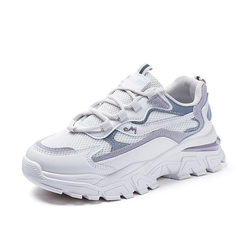 Women's casual wedge sneakers with subtle lift, versatile everyday style, pairs with jeans or dresses