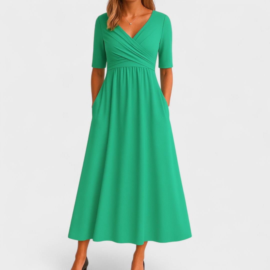 Women's wrap midi dress with V-neck, ruched waist, elbow sleeves, and side pockets for everyday elegance