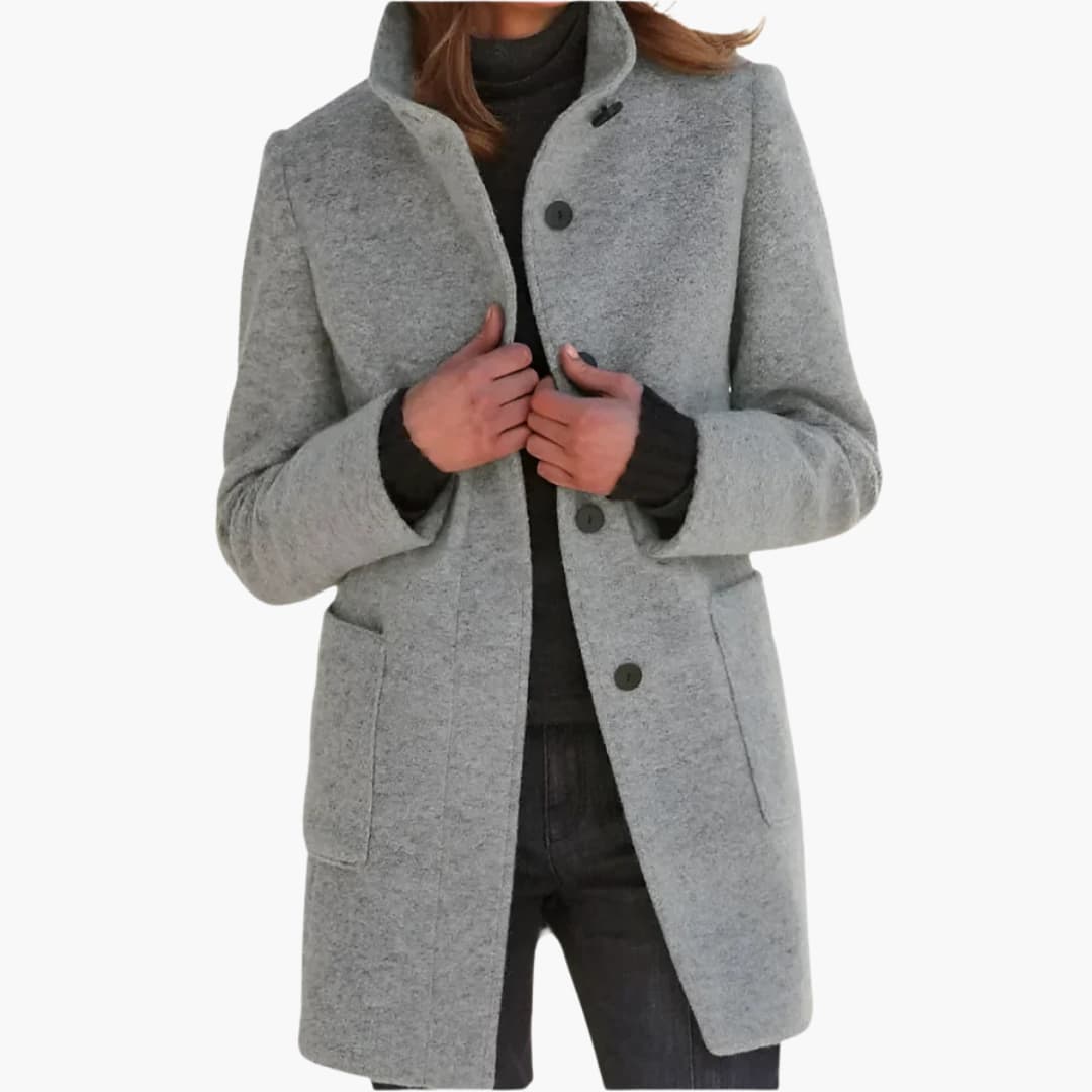 Women's mid-length stand collar coat with front patch pockets, chic structured everyday outerwear